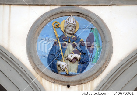 St. Bonaventure, glazed terracotta tondo by Andrea della Robbia, located between two arches of the old Ospedale di San Paolo, in Florence, Italy St. Bonaventure, glazed terracotta tondo by Andrea della Robbia, located between two arches of the old Ospedale di San Paolo, in Florence, Italy 140670301