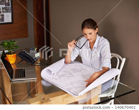 Architecture, thinking and woman with blueprint for ideas, development and planning a design at her office desk. Professional designer brainstorming, solution and engineering with floor plan or paper Architecture, thinking and woman with blueprint for ideas, development and planning a design at her office desk. Professional designer brainstorming, solution and engineering with floor plan or paper 140670402