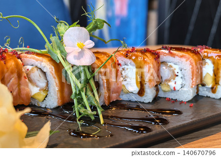 Close Up Gourmet Salmon Sushi Roll With Garnish Close Up Gourmet Salmon Sushi Roll With Garnish 140670796