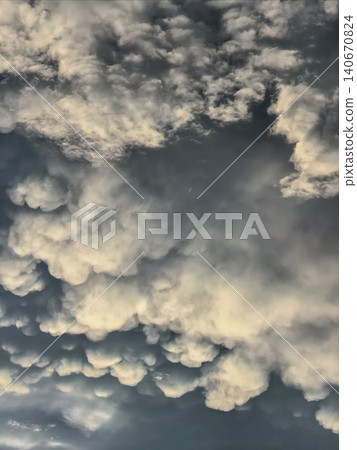 Close Up Mammatus Clouds In Stormy Evening Sky 140670824