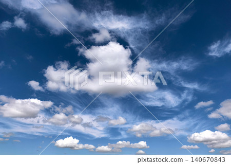 Dramatic Blue Sky With Layered White Clouds Dramatic Blue Sky With Layered White Clouds 140670843