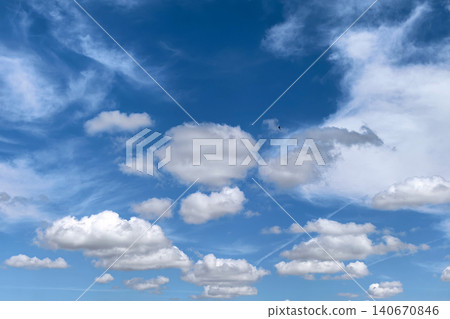 Cloudscape With Swallow Flying Across Blue Sky Cloudscape With Swallow Flying Across Blue Sky 140670846