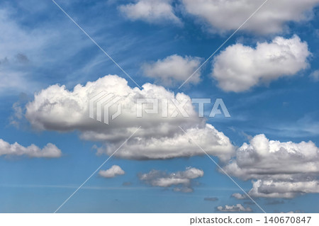 Large White Cumulus Clouds In Bright Blue Sky Large White Cumulus Clouds In Bright Blue Sky 140670847