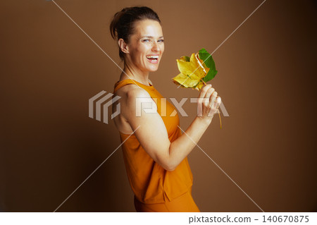 Autumn Joy with Vibrant Leaves and Activewear 140670875
