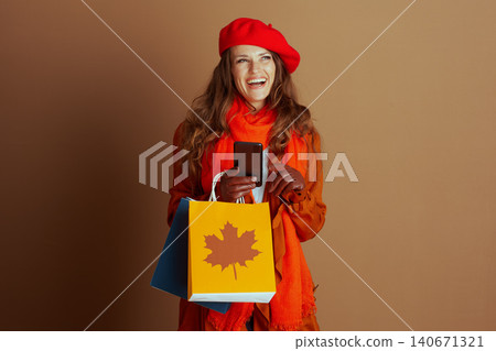 Happy Woman Laughing After Successful Autumn Shopping Happy Woman Laughing After Successful Autumn Shopping 140671321