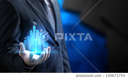 Businessman holding a glowing virtual blue bar chart with percentage symbols representing financial growth, interest rates, investment returns, and economic data analysis Businessman holding a glowing virtual blue bar chart with percentage symbols representing financial growth, interest rates, investment returns, and economic data analysis 140671754