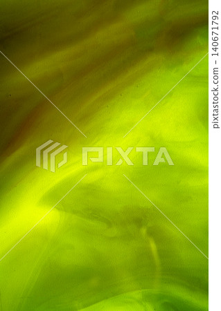A dynamic abstract background with a blend of vibrant green and yellow colors, featuring a soft textured, smoke-like fluid motion perfect for creative designs A dynamic abstract background with a blend of vibrant green and yellow colors, featuring a soft textured, smoke-like fluid motion perfect for creative designs 140671792