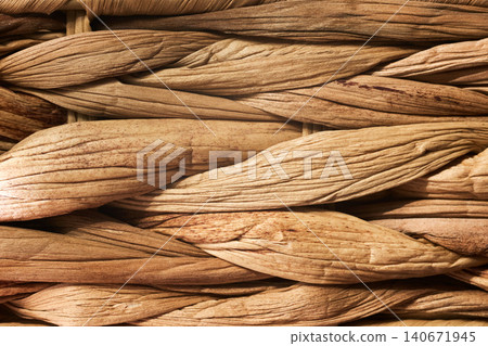 Macro texture of hand-woven natural water hyacinth basket Macro texture of hand-woven natural water hyacinth basket 140671945
