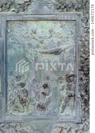 Adoration of the Shepherds, detail of the bronze door to the left of the Cathedral St. Mary of the Assumption in Pisa, Italy Adoration of the Shepherds, detail of the bronze door to the left of the Cathedral St. Mary of the Assumption in Pisa, Italy 140672178