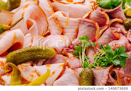 Cold cuts platter with sliced beef and ham Cold cuts platter with sliced beef and ham 140673689
