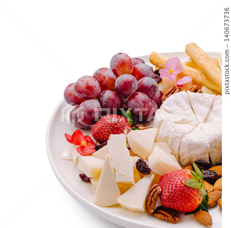 Cheese and fruit platter with fresh grapes and strawberries Cheese and fruit platter with fresh grapes and strawberries 140673736