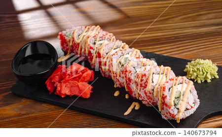 California roll sushi set serving on black slate board California roll sushi set serving on black slate board 140673794