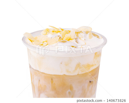 Iced coffee drink with whipped cream and almond slices 140673826