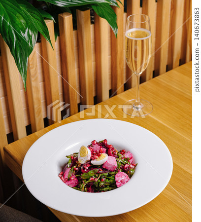 Beetroot salad with quail eggs and champagne 140673863
