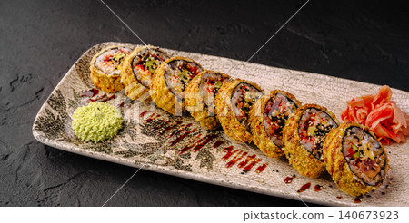 Tempura sushi rolls served with wasabi and pickled ginger Tempura sushi rolls served with wasabi and pickled ginger 140673923