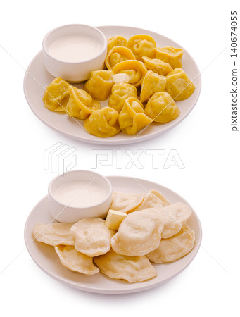 Pelmeni and vareniki with sour cream and butter Pelmeni and vareniki with sour cream and butter 140674055