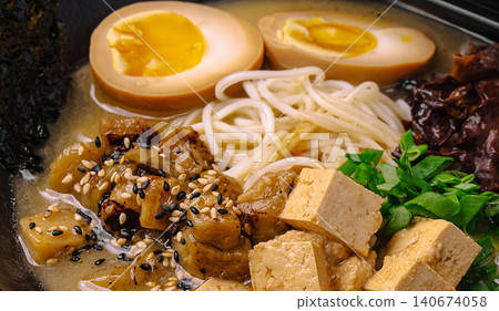 Japanese ramen noodles with soft boiled egg and tofu Japanese ramen noodles with soft boiled egg and tofu 140674058
