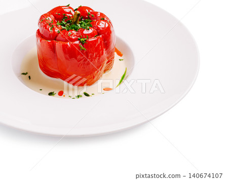 Stuffed red bell pepper with creamy sauce gourmet dish 140674107