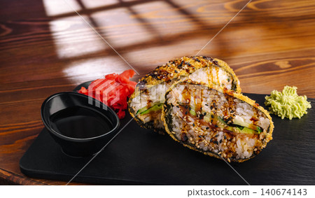 Fried sushi rolls with soy sauce ginger and wasabi Fried sushi rolls with soy sauce ginger and wasabi 140674143