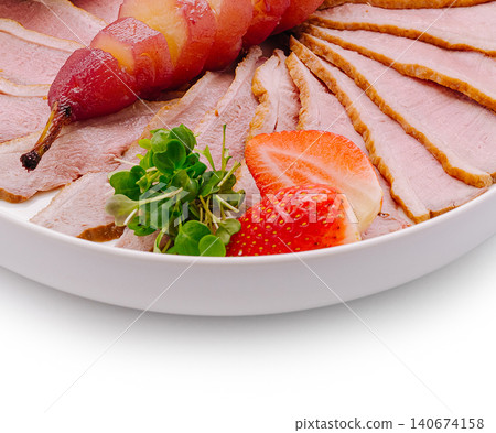 Sliced duck breast with poached pears, strawberries, microgreens Sliced duck breast with poached pears, strawberries, microgreens 140674158