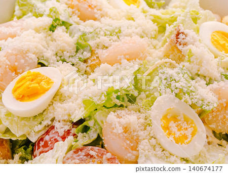 Shrimp caesar salad with boiled eggs and parmesan cheese Shrimp caesar salad with boiled eggs and parmesan cheese 140674177