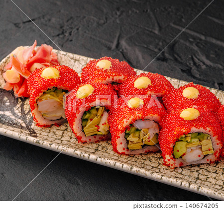 Sushi california rolls with red tobiko and ginger Sushi california rolls with red tobiko and ginger 140674205