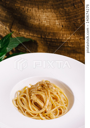 Linguine pasta with cream sauce and black pepper Linguine pasta with cream sauce and black pepper 140674276