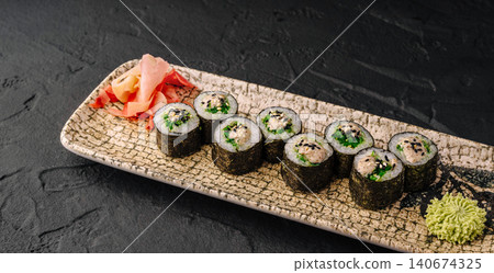 Tuna maki sushi rolls with ginger and wasabi Tuna maki sushi rolls with ginger and wasabi 140674325