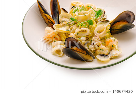Seafood pasta with mussels, prawns, and calamari Seafood pasta with mussels, prawns, and calamari 140674420