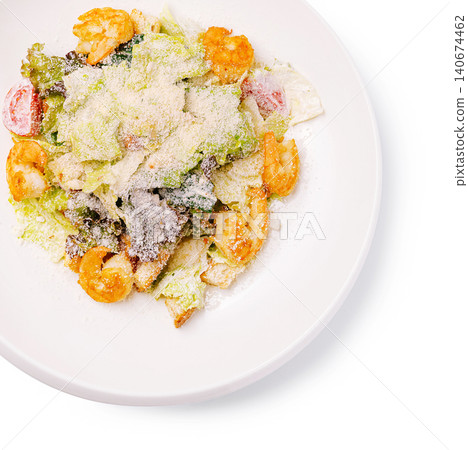 Shrimp caesar salad served with parmesan cheese and fresh vegetables Shrimp caesar salad served with parmesan cheese and fresh vegetables 140674462