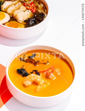 Spicy tom yum soup and chicken ramen noodle bowl 140674478