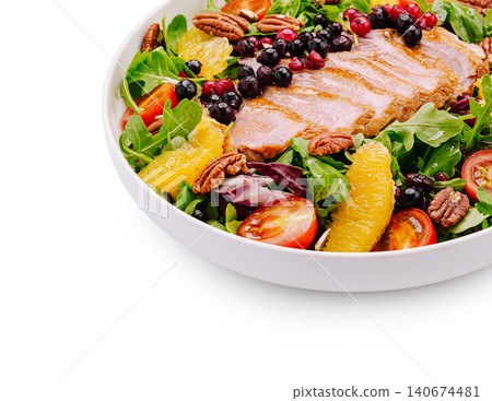 Gourmet duck breast salad with berries and nuts 140674481