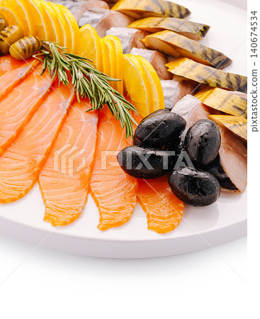 Seafood platter with smoked salmon and mackerel on white plate 140674534