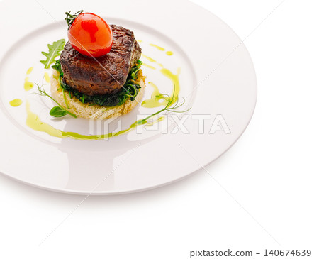 Grilled beef steak on toast with spinach and tomato Grilled beef steak on toast with spinach and tomato 140674639