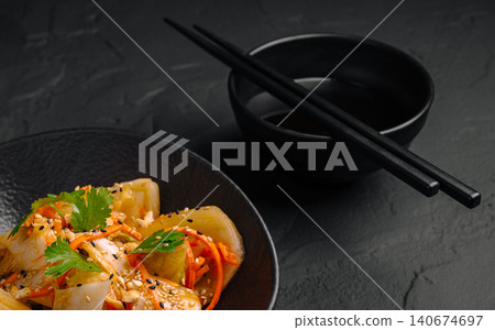 Korean pickled daikon radish kimchi salad Korean pickled daikon radish kimchi salad 140674697