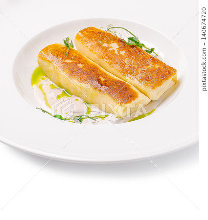 Golden fried pancakes with creamy mushroom sauce Golden fried pancakes with creamy mushroom sauce 140674720