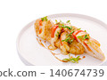 Grilled chicken breast with melted cheese and tomatoes 140674739