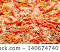Pizza with ground meat, red bell peppers, and cheese toppings 140674740