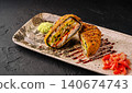 Crispy sushi sandwich with tempura, avocado, and unagi sauce 140674743