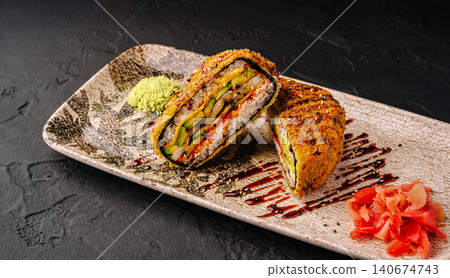 Crispy sushi sandwich with tempura, avocado, and unagi sauce 140674743