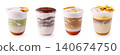 Assorted layered sweet cold drinks with cream topping 140674750