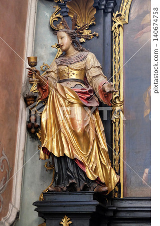 Saint Barbara on the altar of St. Anne in Parish church in St. Wolfgang on Wolfgangsee in Austria 140674758