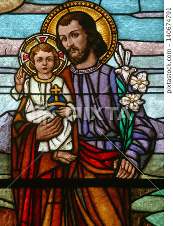 Saint Joseph holding baby Jesus 140674791