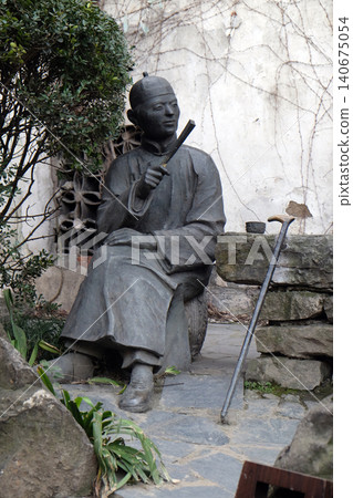 Statue in Xitang Ming and Qing Dynasty Residence Wood Carving Exhibition Hall, Xitang town in Zhejiang Province, China Statue in Xitang Ming and Qing Dynasty Residence Wood Carving Exhibition Hall, Xitang town in Zhejiang Province, China 140675054