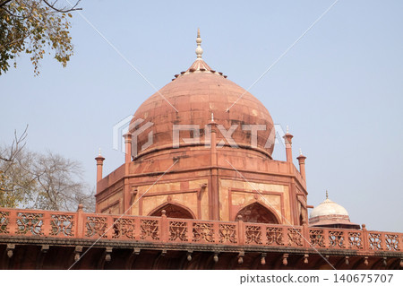 Gate to the Taj Mahal (Crown of Palaces), an ivory-white marble mausoleum in Agra, Uttar Pradesh, India 140675707