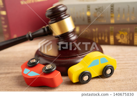 Car accident lawsuit and insurance, Judge hammer with car model. 140675830