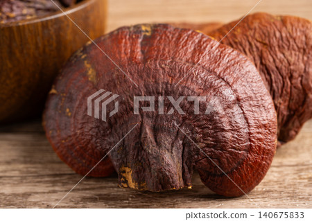 Lingzhi or Reishi mushroom with capsules, organic natural healthy food. Lingzhi or Reishi mushroom with capsules, organic natural healthy food. 140675833