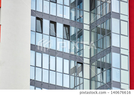 Geometric pattern of urban building exterior with colorful panels 140676616
