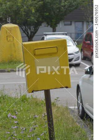 Yellow post box of Croatian Post on a street background Yellow post box of Croatian Post on a street background 140676952