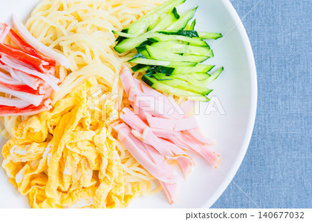 A classic summer dish featuring the toppings of chilled ramen. A classic summer dish featuring the toppings of chilled ramen. 140677032